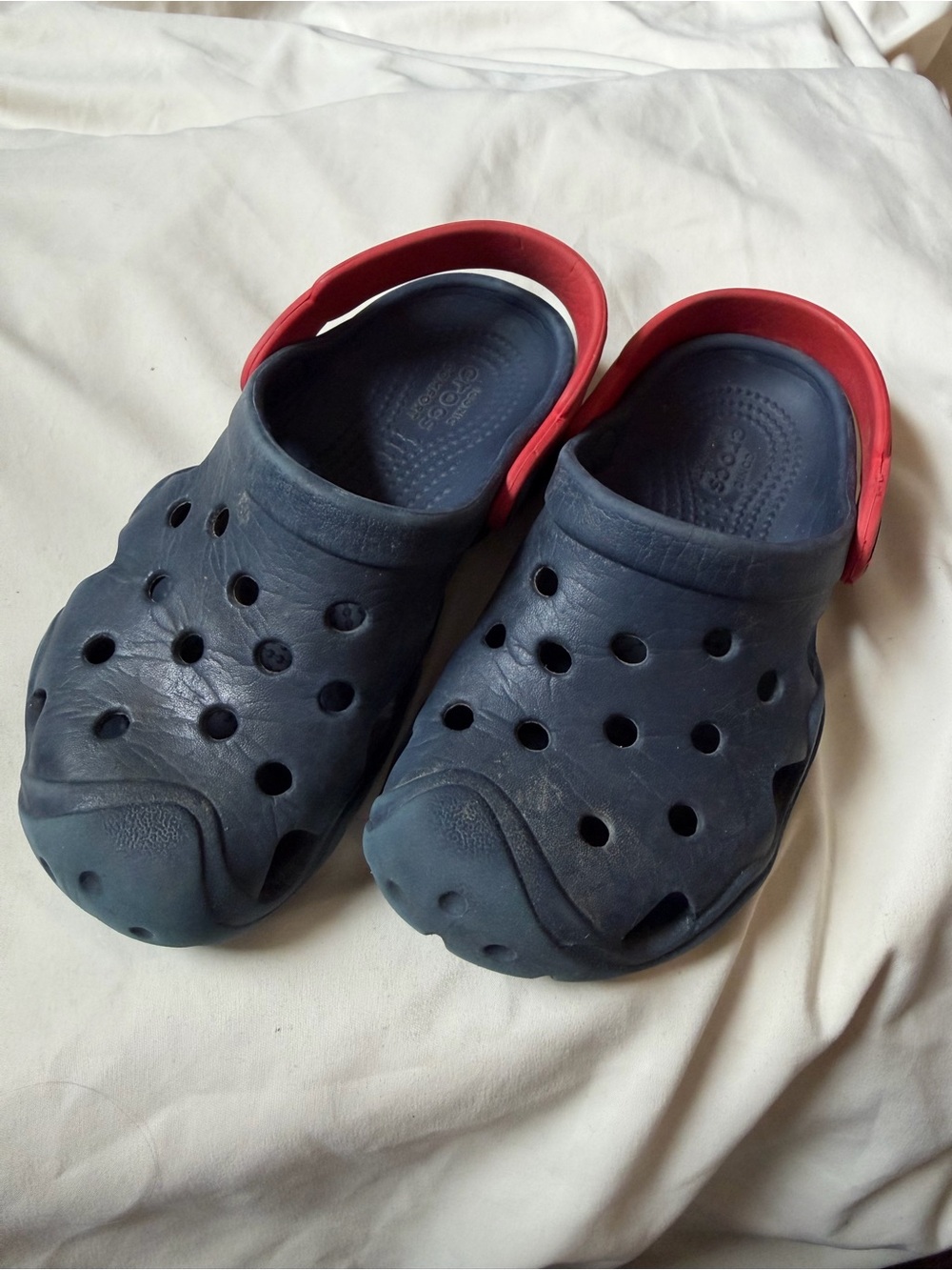 CROCS Kids Navy Clog with Red Heel Strap